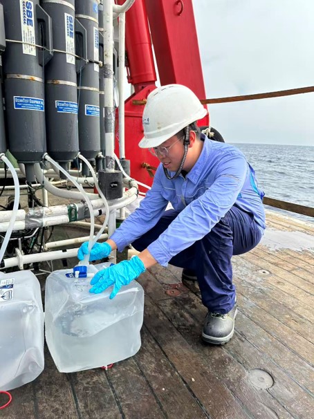 Chaofeng was collecting seawater samples from the CTD rosettes